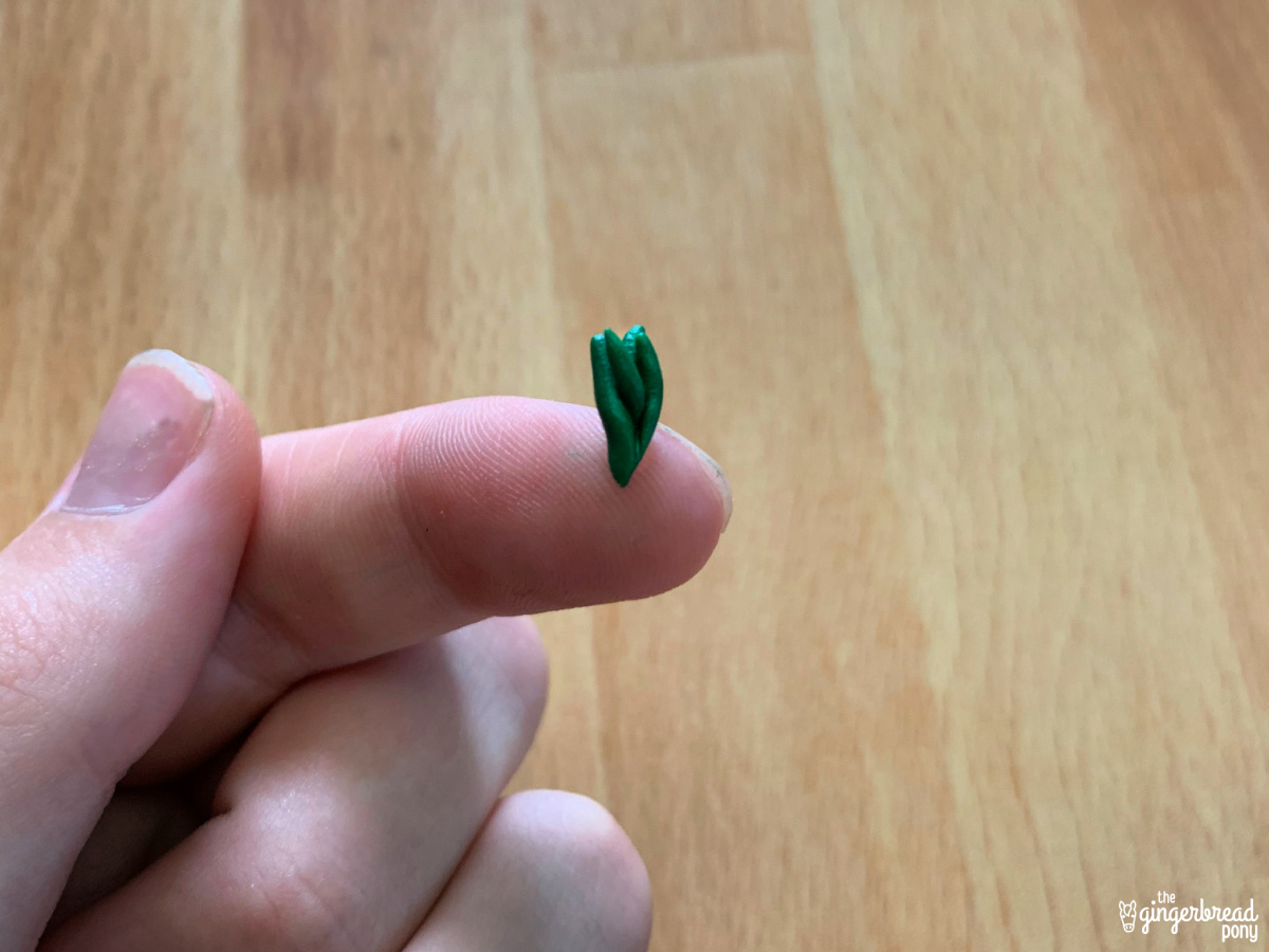 Polymer clay green carrot shoots