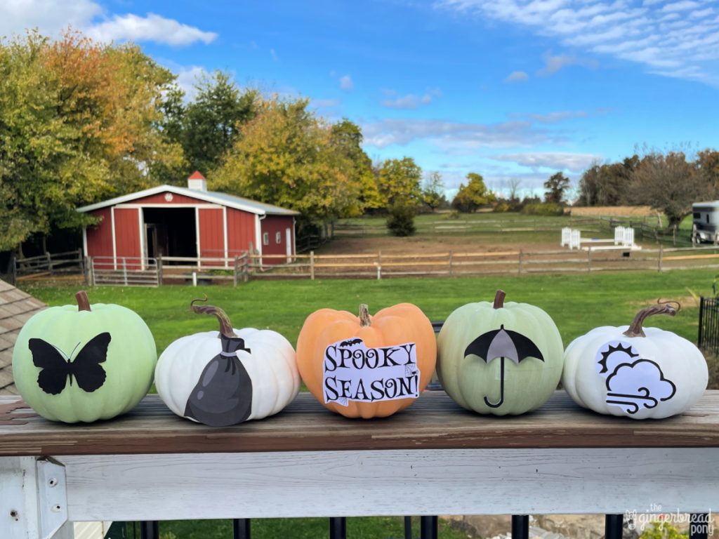Spooky pumpkins in a row