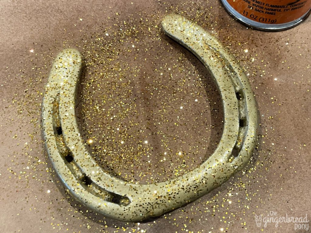 Gold glitter on horse shoe
