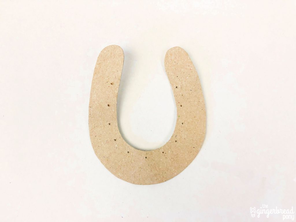 cardboard horse shoe with holes